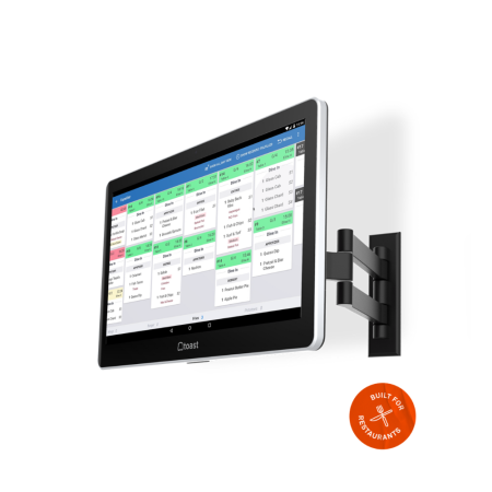 Toast Kitchen Display System mounted on wall showing digital restaurant order tickets