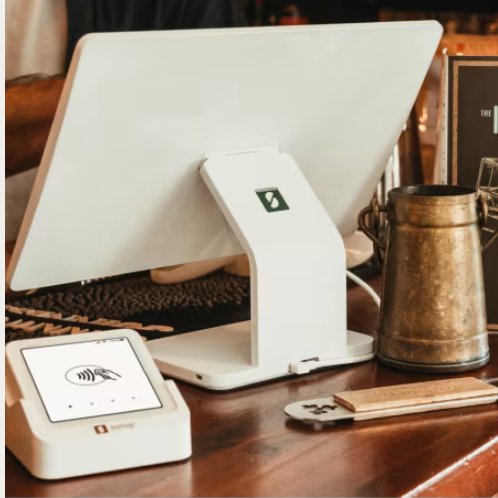 SumUp POS Lite register with touchscreen and card reader on retail countertop